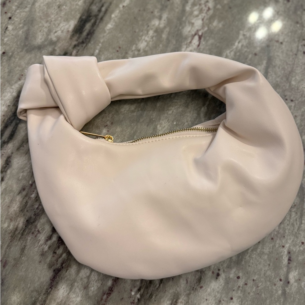 Cream Mini Bag with Twisted Handle and Soft Slouchy Design NWOT’s!